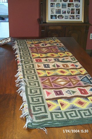 This rug is 5' x 7'.  And heavy wool.