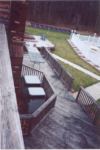 From the master bedroom's private balcony. In the background are the solar panels to heat the pool. Hot tub can be seen in the upper left.
