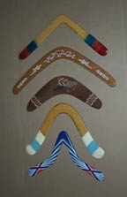 Photo: Six boomerangs arranged nose up to suggest a fish skeleton. Copyrights © held by the individual artists.