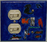 Photo: Painted switchplate of cardinal, fish and fisherman, cat, dog, and train against a blue sky, by John Williams.