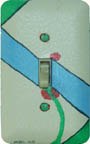 Photo: Painted switchplate of an abstract diagonal, by Mike Carroll.