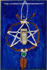 Photo: Painted switchplate of a dream catcher, by Sharon Stroick.