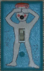 Photo: Painted switchplate of a naked man covering his eyes, by Terry Halifko. This image is rated R!