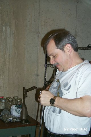 Brian adjusting some arcane piece of gear. The torture device in the background is a bottle capper.