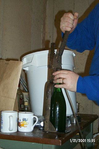 After filling, each bottle is capped using one of the hand-capping tools. Silver caps are one flavor, Pepsi® caps another (no, not Pepsi...)