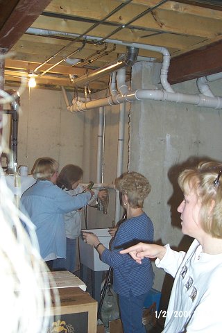 The wash-to-disinfectant bucket brigade.