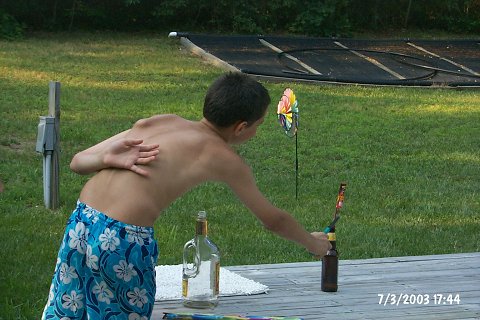 Owen, being "forced" to light a bottle rocket.