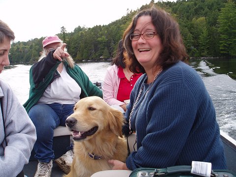 Mardi, pointing out the cliffs.  (Gail, Mardi, Lance the Affection Hound, Wendy, Nina)